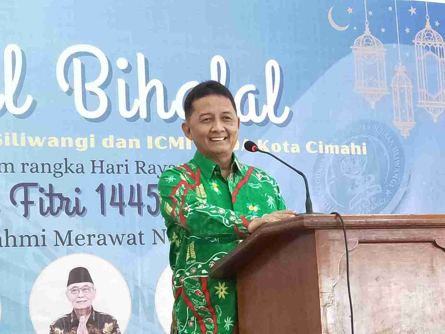 Dr. Eki Baihaki, M.Si